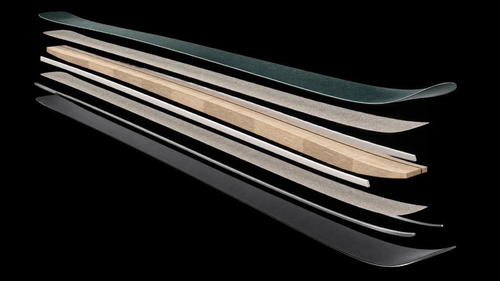 Exploded view of a Peak2002 ski: replaceable skin, flax-and-glass laminates, wood core, sidewalls, steel edges, and base