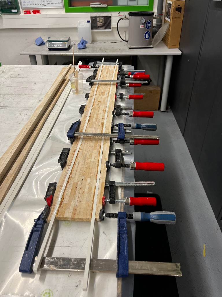 Sidewalls being bonded to a Peak2002 wooden core