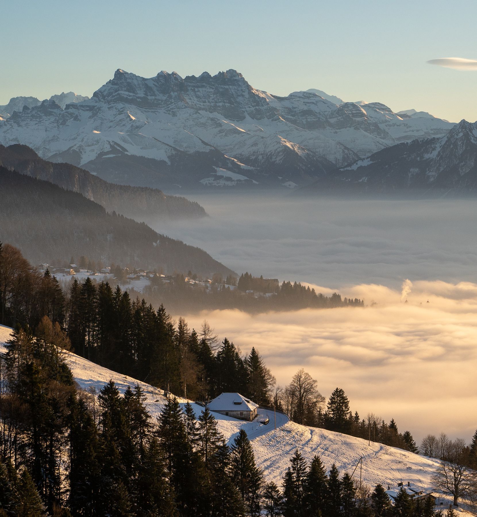 Dents du Midi above a sea of fog seen from Le Folly